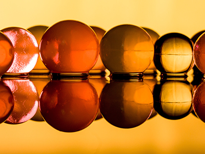 image of sphears on a reflective iamge